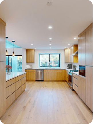 Bay Area modern kitchen with wooden cabinets and new flooring.