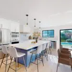 Contemporary dining room and kitchen in Cambrian San Jose remodel with pendant lighting