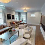 Spacious Palo Alto family room with open-concept layout and luxury hardwood floors