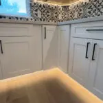 Custom LED toe-kick cabinet lighting installed during this San Jose fire restoration and kitchen remodeling project.